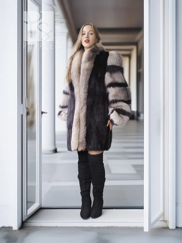 Mink fur jacket with gray fox-fur trim and striped sleeves, standing front view.