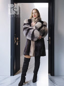 Dark mink jacket with long fox-fur trim panels, open front, and fluffy cuffs