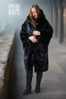 Black hooded mink coat with drawstrings, buttonless front and mid-length pockets
