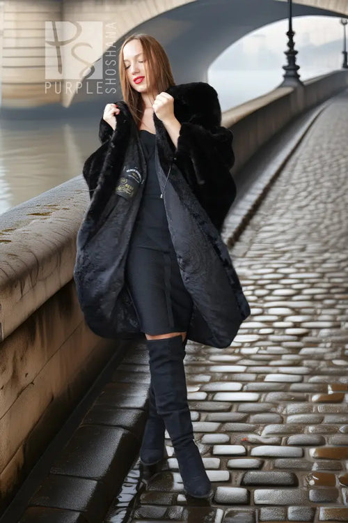 Black mink hooded coat with front opening, long sleeves and pockets