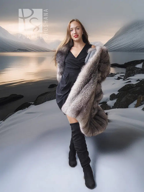 Fox fur coat with shawl collar, full-length gray fur drape worn open over black dress