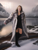 Fox fur coat with shawl collar, long gray fur silhouette over black dress and tall boots