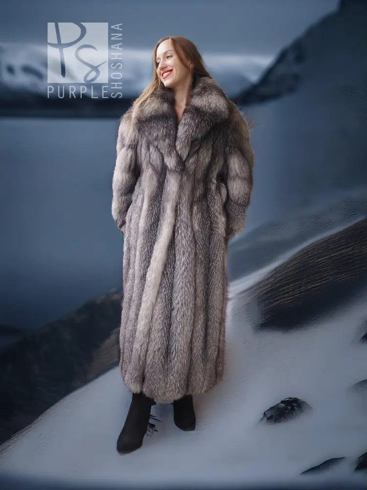 Long fox fur coat with shawl collar, gray pelt texture and open front over black dress