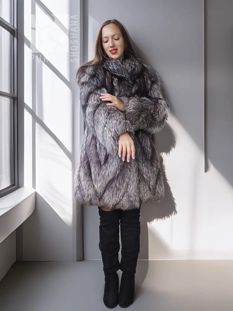 Silver fox fur coat in dark gray, standing collar, thick fur texture, long sleeves.