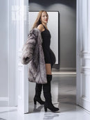 Silver fox fur coat with textured long sleeves and open front over black dress