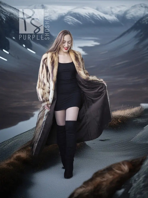Long fur coat with beige-brown striped fur, draped front silhouette, standing pose.
