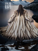 Long fur coat, back view with flowing striped fur and open sides, beige-brown tone.