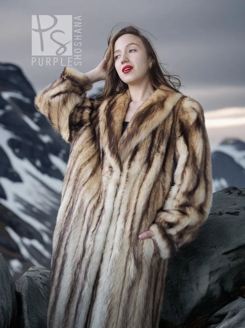 Long striped fur coat with standing collar, tan and dark fur texture on sleeves.