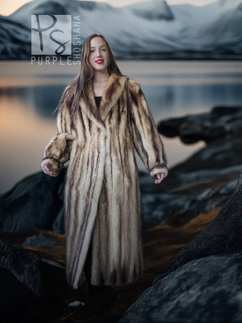 Long fur coat with open front and tall fur collar, beige-brown striped texture.