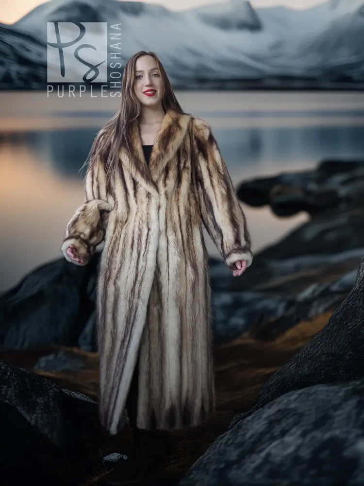 Long fur coat with open front and tall fur collar, beige-brown striped texture.