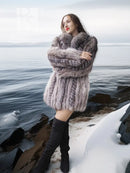 Platinum silver faux fur coat with stand collar and long sleeves, side view