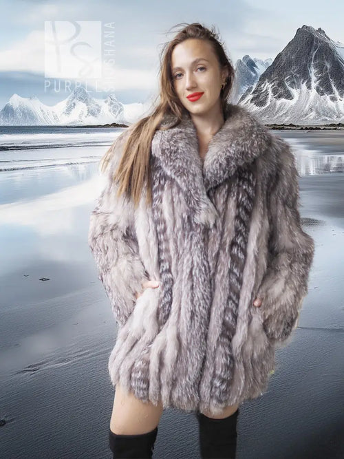 Platinum silver faux fur coat with stand collar and long sleeves, close-up front