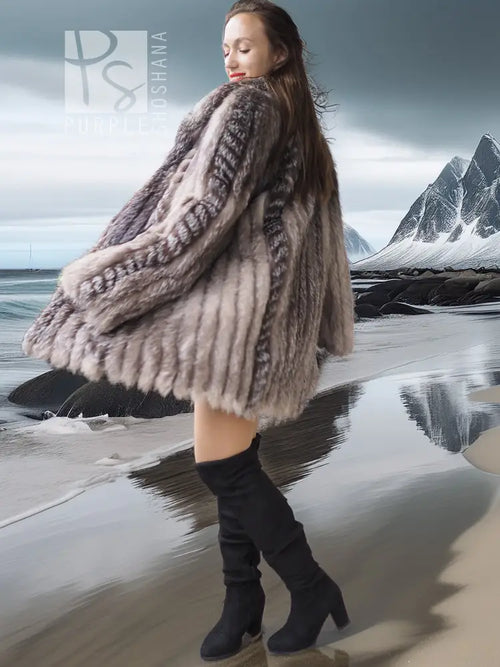 Platinum silver faux fur coat with stand collar, long sleeves, curved hem