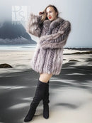 Platinum silver fox fur jacket with stand collar and layered texture over black dress