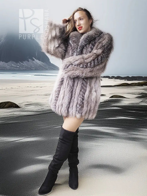 Platinum silver fox fur jacket with stand collar and layered texture over black dress