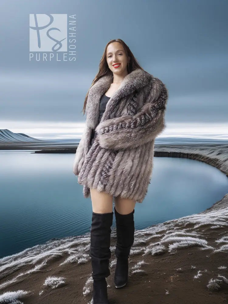 Platinum silver fox fur jacket with thick fur texture over a black dress and boots