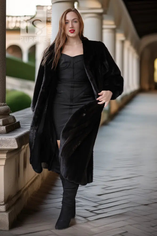 Black fur coat with button-front, long sleeves, mid-calf length, front-facing stance.