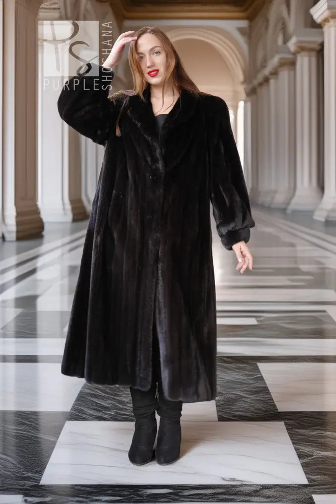 Black long fur coat with button front and raised collar, full-body view