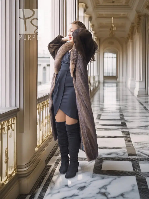Full-length mink coat with dark brown fur trim and long open front