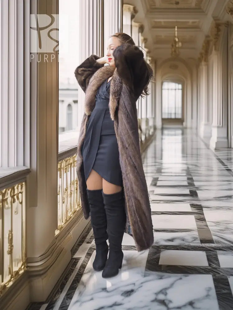 Full-length mink coat with dark brown fur trim and long open front