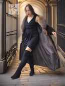 Mahogany-brown full-length mink coat with fur collar over a sleeveless dress
