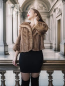 Tan mink fur opera jacket with hood, side view and fluffy collar detail
