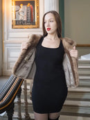 Vintage mink opera jacket with hood, tan fur, front view with jacket held at sides.