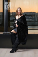 Black mink fur coat with open front, long sleeves, and soft fur collar detail.