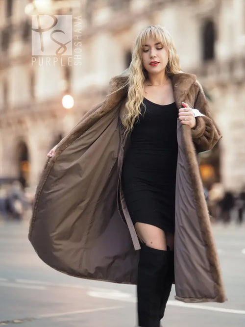 Women’s brown mink fur coat with hood, open front over black top