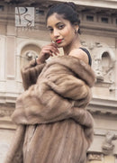 Light brown mink fur coat with hood, fur wrap detail at shoulder.
