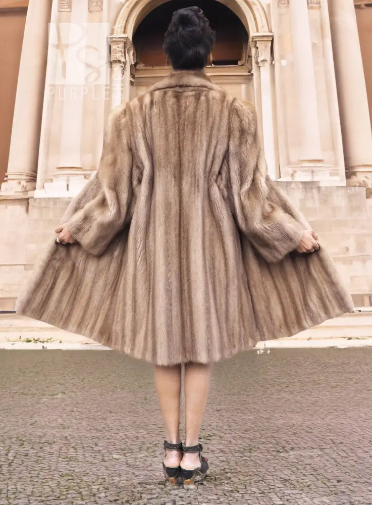 Light brown mink fur coat, back view with flared skirt and full sleeves