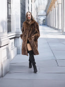 Mink fur swing coat, full-length dark brown with pointed collar and directional stripes