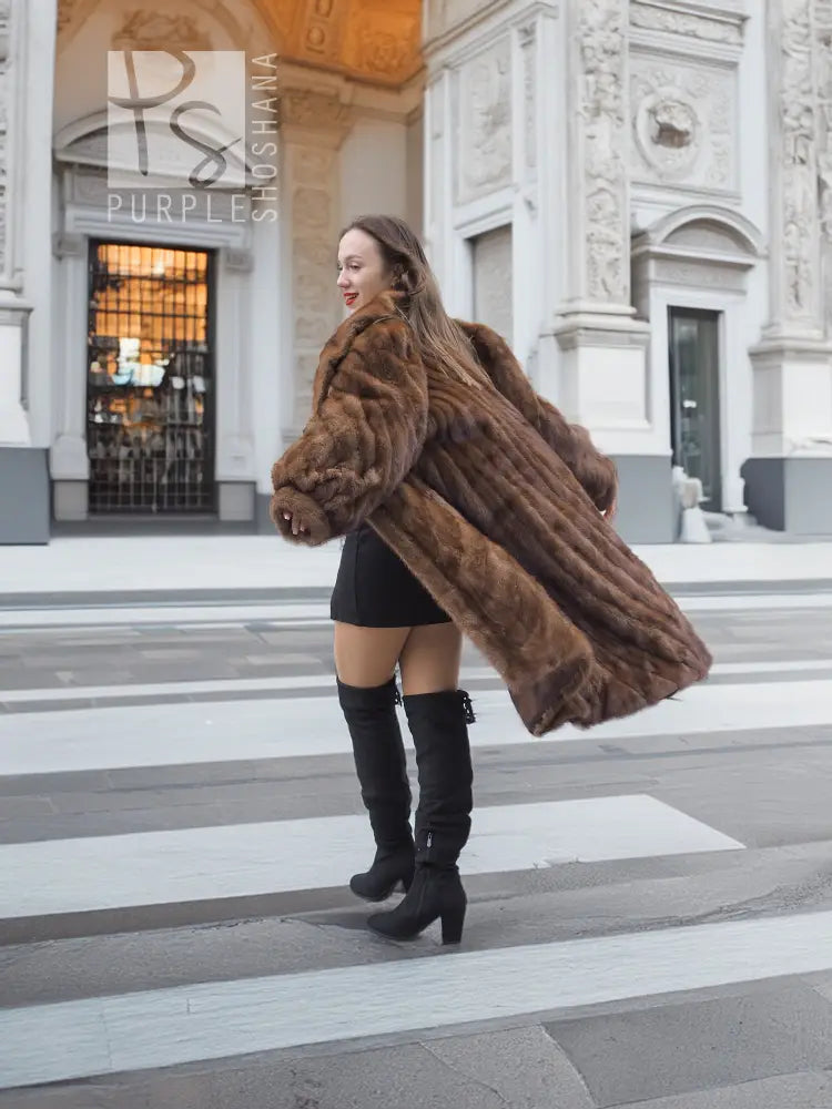 Brown mink fur coat with hood, flowing side drape, directional pattern texture
