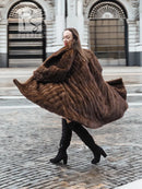 Hooded brown mink fur coat with directional stripes, wide swing silhouette