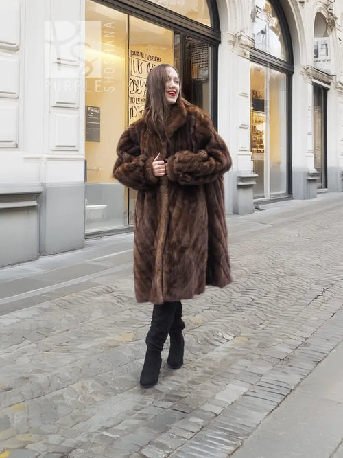 Brown mink fur coat with hood and button front, long sleeves, full front view