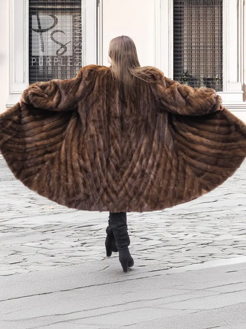 Mink fur swing coat with hood, brown directional stripe texture, back view