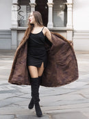 Swing mink fur coat with wide sleeves and open front, dark brown directional design