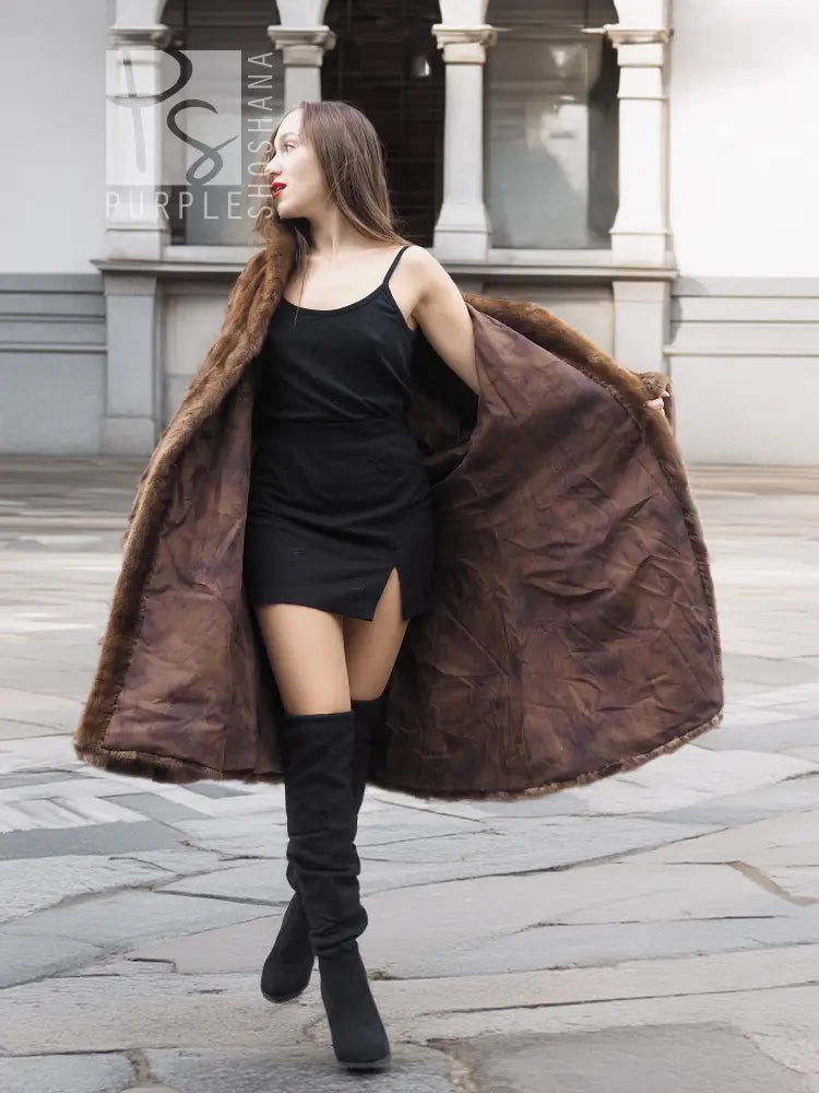 Swing mink fur coat with wide sleeves and open front, dark brown directional design