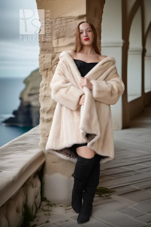 Pearl mink swing coat with hood, cream fur, wrap-style front, flared sleeves