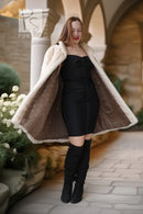 Pearl Mink Coat in cream, open swing hem shows dark lining inside and side pockets