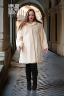 Cream mink coat with swing silhouette, plush collar, and long sleeves