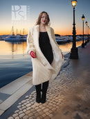 Cream fur coat with diagonal design, long sleeves and side pockets, full length.