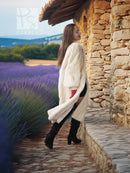 Cream long fur coat with side seam shaping and open front