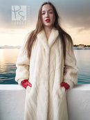 Cream fur coat with open front and shawl collar; front close-up