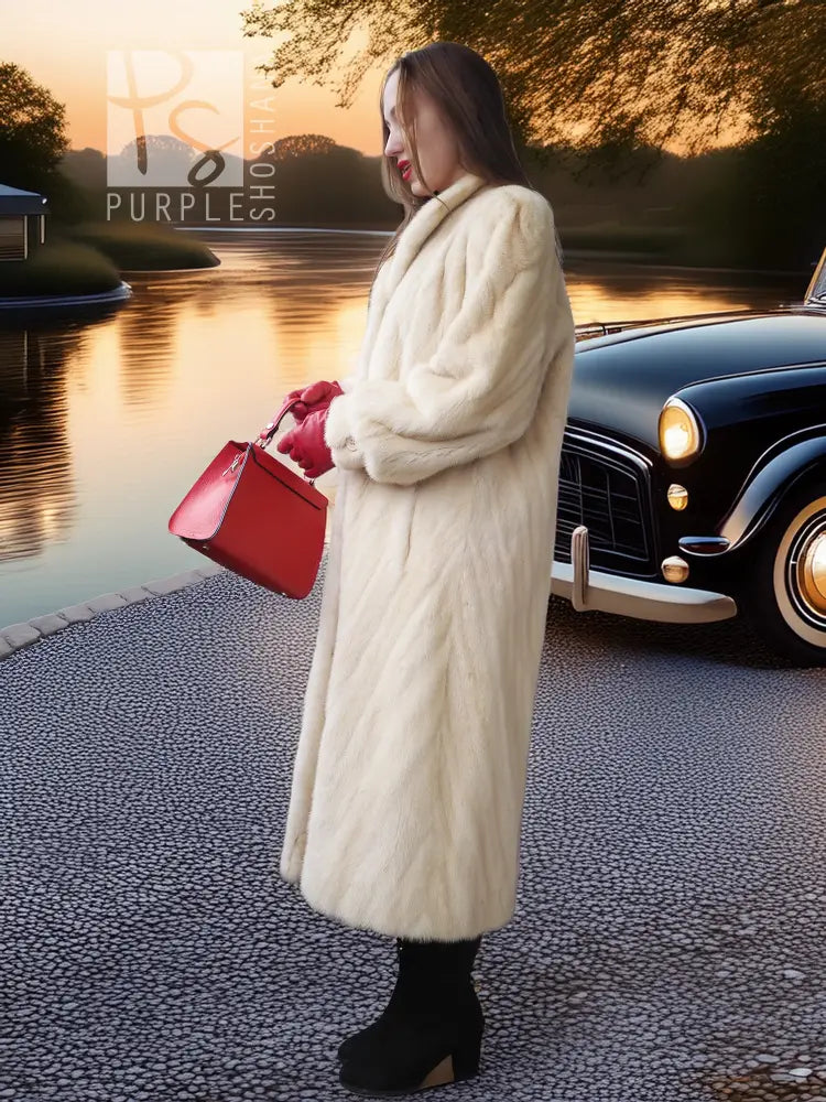 Cream fur coat, long open design with shawl collar; side view