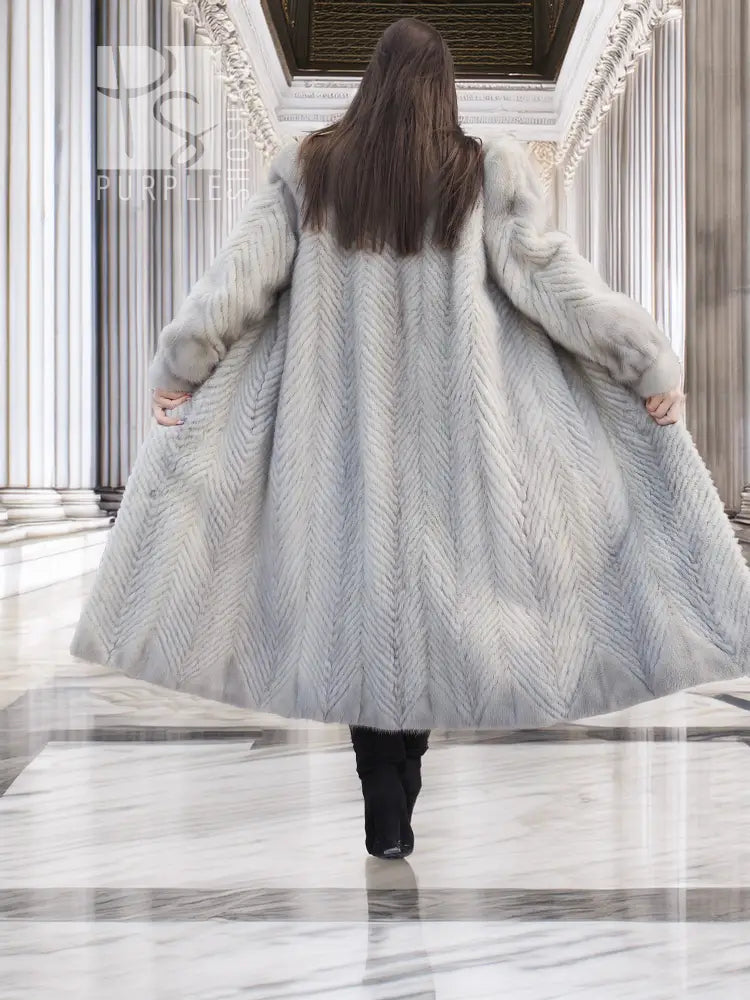 Light gray long mink-style coat shown from back with chevron quilting texture.