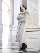 Light gray herringbone mink coat, side view, belted waist detail and fur collar