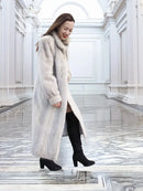 Light gray faux mink long coat with open front and plush collar, side view.
