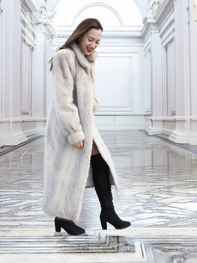 Light gray faux mink long coat with open front and plush collar, side view.