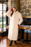 White mink fur coat with red fox-trim cuffs, plush texture, open front, long sleeves